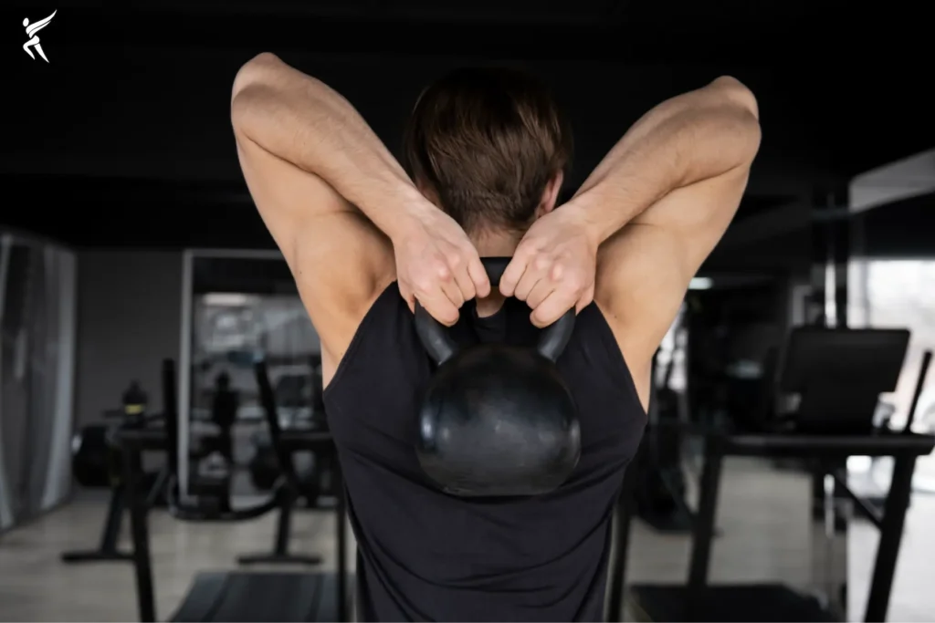 Guide To Best Tricep Workouts with Dumbbells for Bigger Arms) Overhead Dumbbell Extension